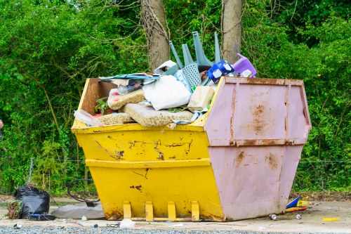 Clean construction site with waste being cleared in Bromley